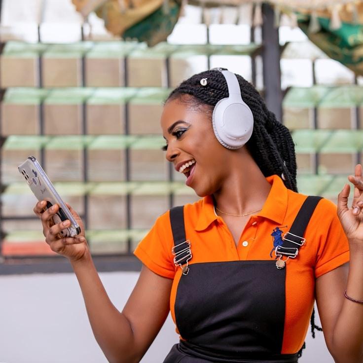 Kaveri Mehta, Lead Design Curator at StudioCompassView, reviewing corporate floral arrangements